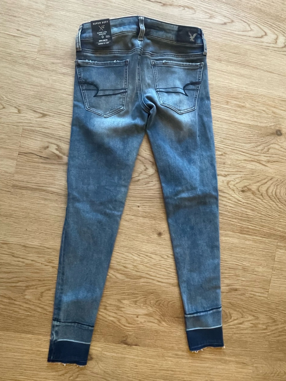 American Eagle Outfitters Ripped Dark-Mid Blue Skinny Jeans